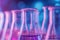 Neon purple glass flask in blue research chemistry or medical lab. Laboratory glassware, test tube and beaker