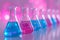 Neon purple glass flask in blue research chemistry or medical lab. Laboratory glassware, test tube and beaker