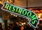 Neon Restroom Sign Pointing Down