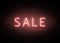 Neon sale banner. Luminous light red type text sign on dark dots backdrop