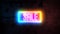 Neon sale sign on brick wall background