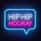 Neon sign hip hip hooray in frame on dark background