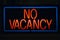 Neon sign reads No Vacancy