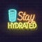 Neon stay hydrated typography with glass of water icon. Fluorescent illustration for poster, banner. Isolated vector