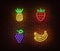 Neon vegetables fruits signs vector isolated on brick wall. Pineapple, strawberry, grape, banana lig