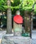 Neophyte stone statue red scarf stand