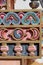 Nepal,Detail of moon and clouds ornamentation in a gold background of a tibetan buddhist stupa.