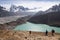 Nepal Female Tourist Hikking at gokyo ri mountain peak near gokyo lake during Everest base camp trekking in nepal