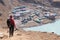 Nepal Female Tourist Hikking at gokyo ri mountain peak near gokyo lake during Everest base camp trekking in nepal