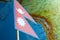 Nepal flag with a globe map as a background