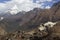 Nepal, the Himalayas, the Everest region. A shaggy Yak stands against a mountain landscape. Behind you can see mount AMA Dablam -