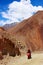 Nepal, Himalayas, the kingdom of Upper Mustang - April 2015: A motorcyclist on a motorcycle rides a mountain road in the mountain