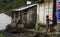 A Nepalese boy and girl play in a very pretty town in the Annapurnas Conservation Area