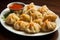 Nepalese Momos On A White Plate