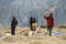 Nepalese people process cereals harvest, Nepal