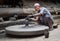 Nepalese potter working in the his pottery workshop