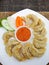 Nepalese and Tibetan traditional dumpling called Momo served wit