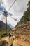 Nepalese woman with Wicker Basket on rural road in Nepal, Everest trekking