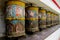 Nepali buddhist prayer wheels with letter symbols