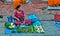 Nepali woman selling vegetables