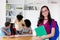 Nerdy female student with eyeglasses and group of international students