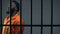 Nervous black prisoner walking in cell, serve in solitary cell, drug dealer