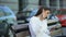 Nervous businesswoman arguing on phone, making notes during work conversation