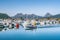 Nesna, Norway - August 06, 2019: View at marina of Nesna: alot of motorboats, sailboats, fisherman boats in calm blue ocean. Trip