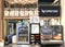 Nespresso coffee machine with fast food snacks in supermarket, Bergamo