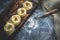 Nests of spaghetti on a wooden Board at the time of cooking homemade pasta