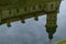 Nesvizh, Belarus - August 2021: Reflection in the water of the moat of the Nesvizh Castle of the Radziwills, a palace and park