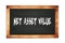 NET  ASSET  VALUE text written on wooden frame school blackboard