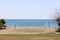 A net on a volleyball court on a deserted beach against the backdrop of a calm sea, Alanya, April, 2021