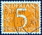NETHERLANDS - CIRCA 1946: A stamp printed in the Netherlands shows it`s value of 5 cent, circa 1946.