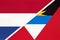 Netherlands or Holland and Antigua and Barbuda, symbol of national flags from textile