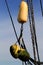Netting and nautical buoys on fishing trawler