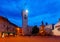 Nettuno Fountain in Duomo square and Civic tower.