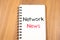 Network news concept on notebook