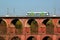 Netzschkau, Germany - April 30, 2023: Vogtland regional train crosses the Goltzsch Viaduct, the largest brick-built railway bridge