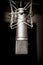 Neumann microphone in a professional audio studio. Black and white photography