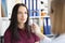 Neurologist doctor driving hammer tool in front of patient eyes in clinic, checkup