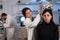 Neurologist doctor woman putting eeg scanner on patient head analyzing brain evolution