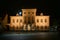 Neustrelitz town hall illuminated at night on the market place in the centre of the city, black sky, Mecklenburg-Vorpommern,