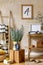 Neutral composition of sitting room interior with brown mock up photo frame, design wooden console, plants in hipster pot.