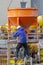 Neuwied, Germany - February 1, 2019: construction workers are filling mortar into pre-cast segments on a building site