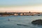 Neva river and the city of Saint Petersburg from above, boats on the water, buildings, embankment at sunset