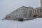 Neva river in ice. Embankment of Winter Canal with Arch and Hermitage Bridge, scenic landmark in St. Petersburg