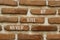 Never give up and support symbol. Concept words Never give up on brick wall. Beautiful brick wall background. Business and never