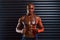 Never skip a gym session. Studio shot of an athletic young man holding a skipping rope around his shoulders against a