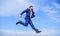 Never stop. Businessman formal suit jump while call smartphone sky background. Businessman solving business problems on